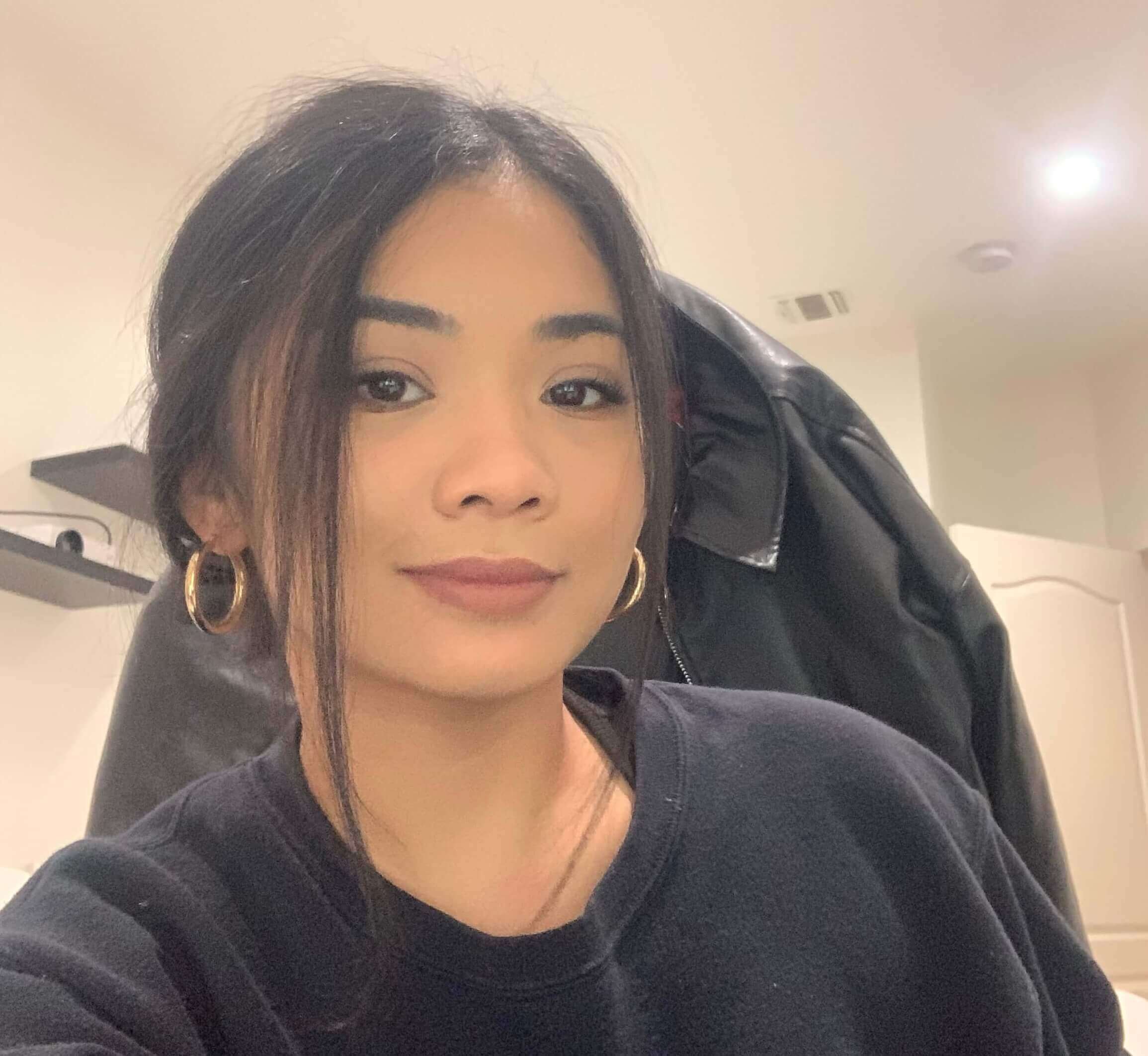 portrait of Kimmie in a black sweater